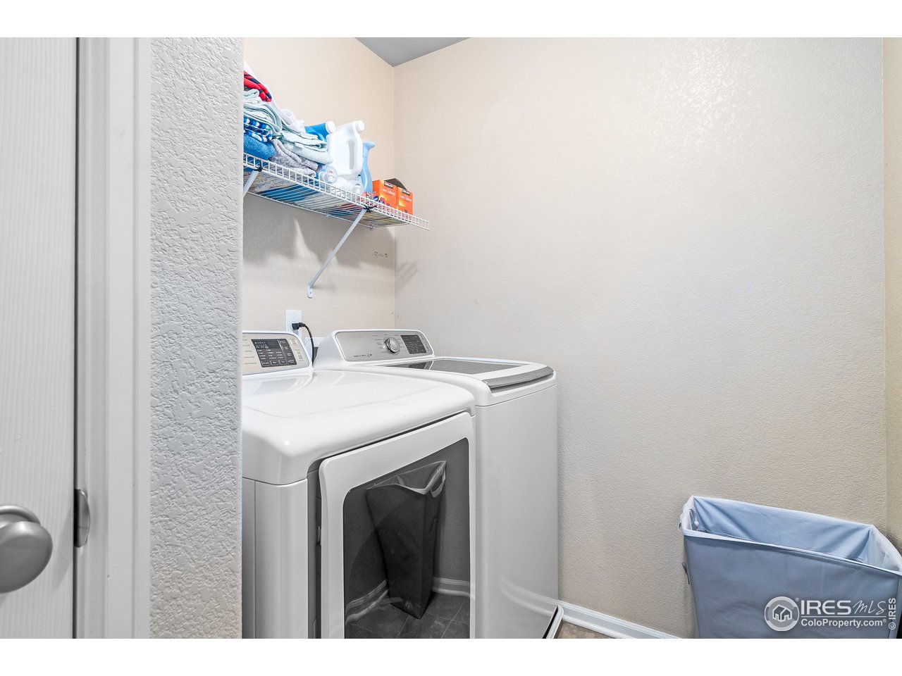 10435 Lower Ridge Road Longmont, CO 80504 - Photo 14 of 26 a utility room with dryer and washer