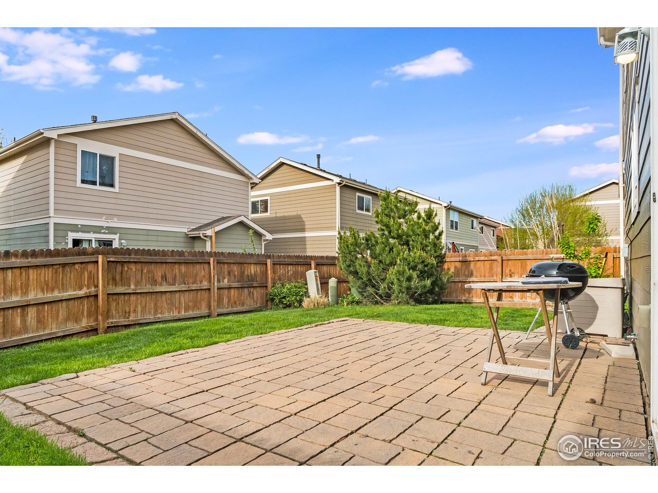 10435 Lower Ridge Road Longmont, CO 80504 - Photo 23 of 26 a view of a house with a yard