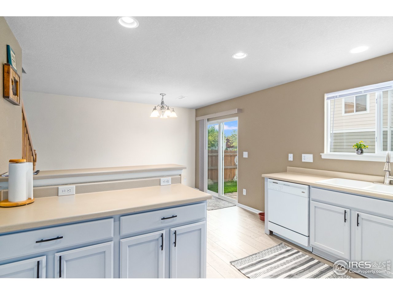 10435 Lower Ridge Road Longmont, CO 80504 - Photo 10 of 26 a spacious bathroom with a sink a large mirror and a shower