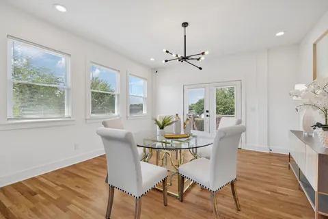 a view of a kitchen with a sink and a window