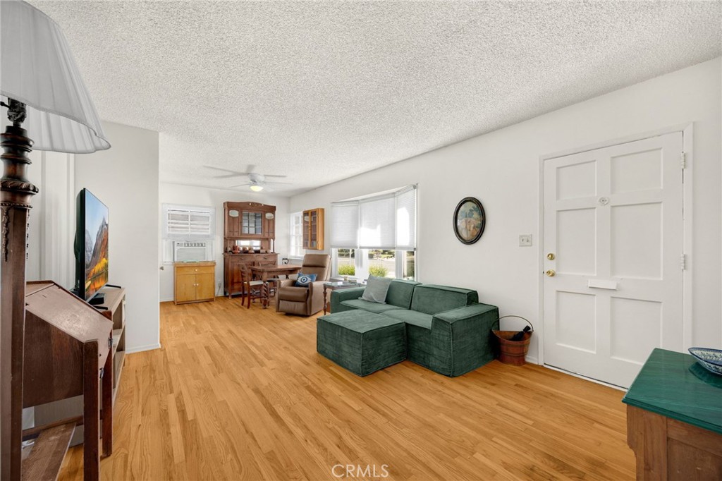4577 Ranger Avenue El Monte, CA 91731 - Photo 13 of 25 a living room with furniture and a flat screen tv