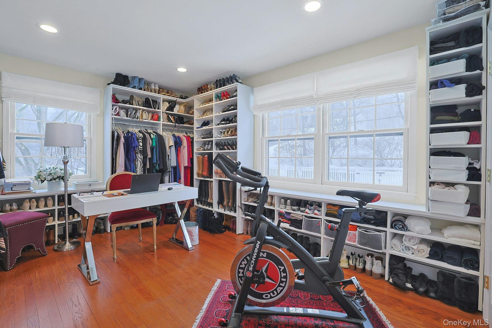 103 River Road Briarcliff Manor, NY 10510 - Photo 12 of 37 a living room with furniture a rug and a book shelf