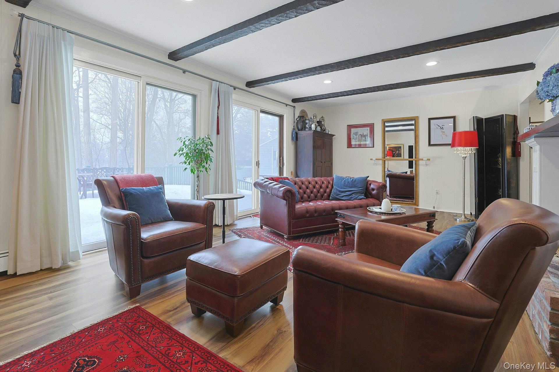 103 River Road Briarcliff Manor, NY 10510 - Photo 17 of 37 a living room with furniture and a large window