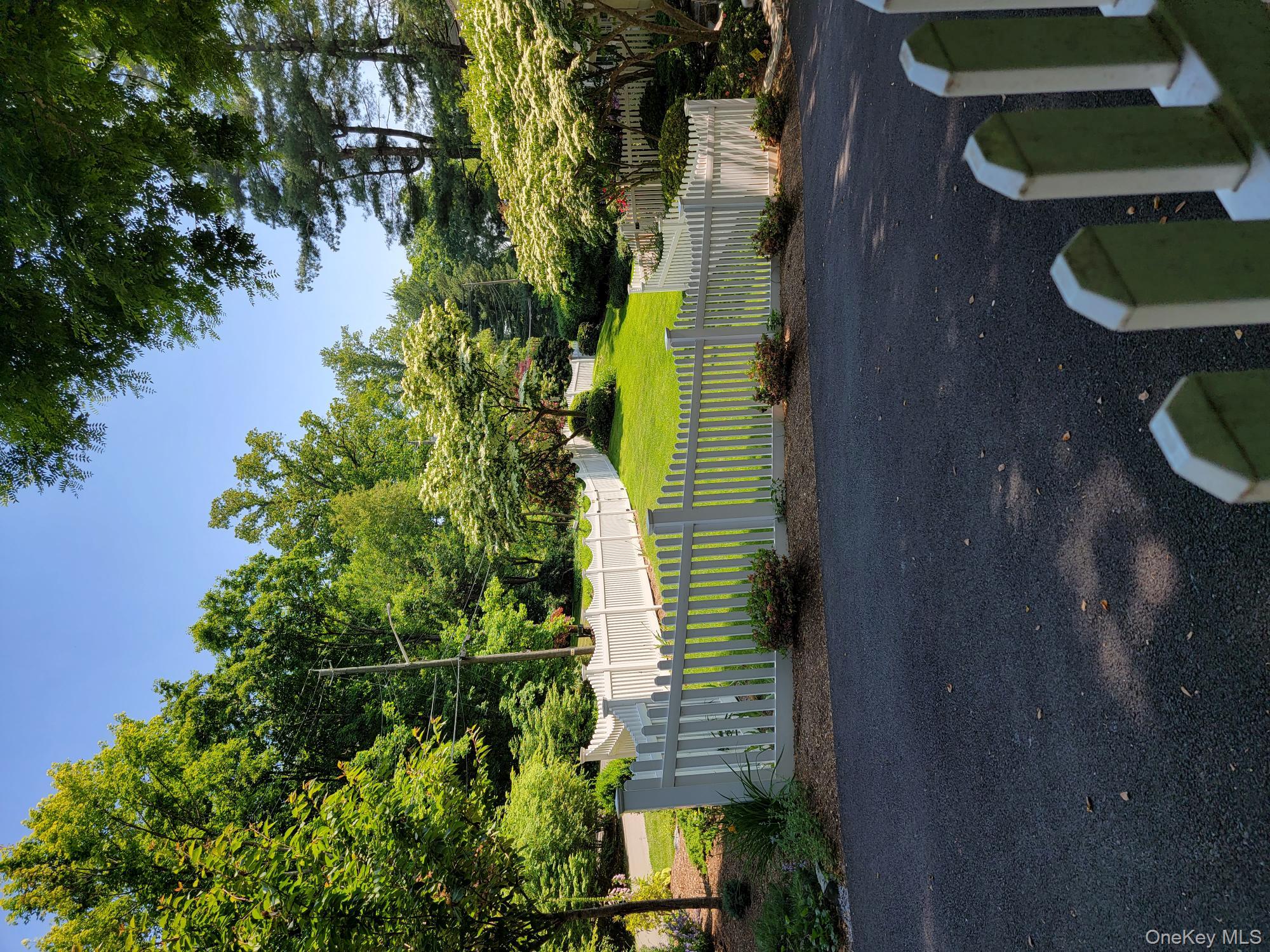 103 River Road Briarcliff Manor, NY 10510 - Photo 32 of 37 a view of a garden with trees
