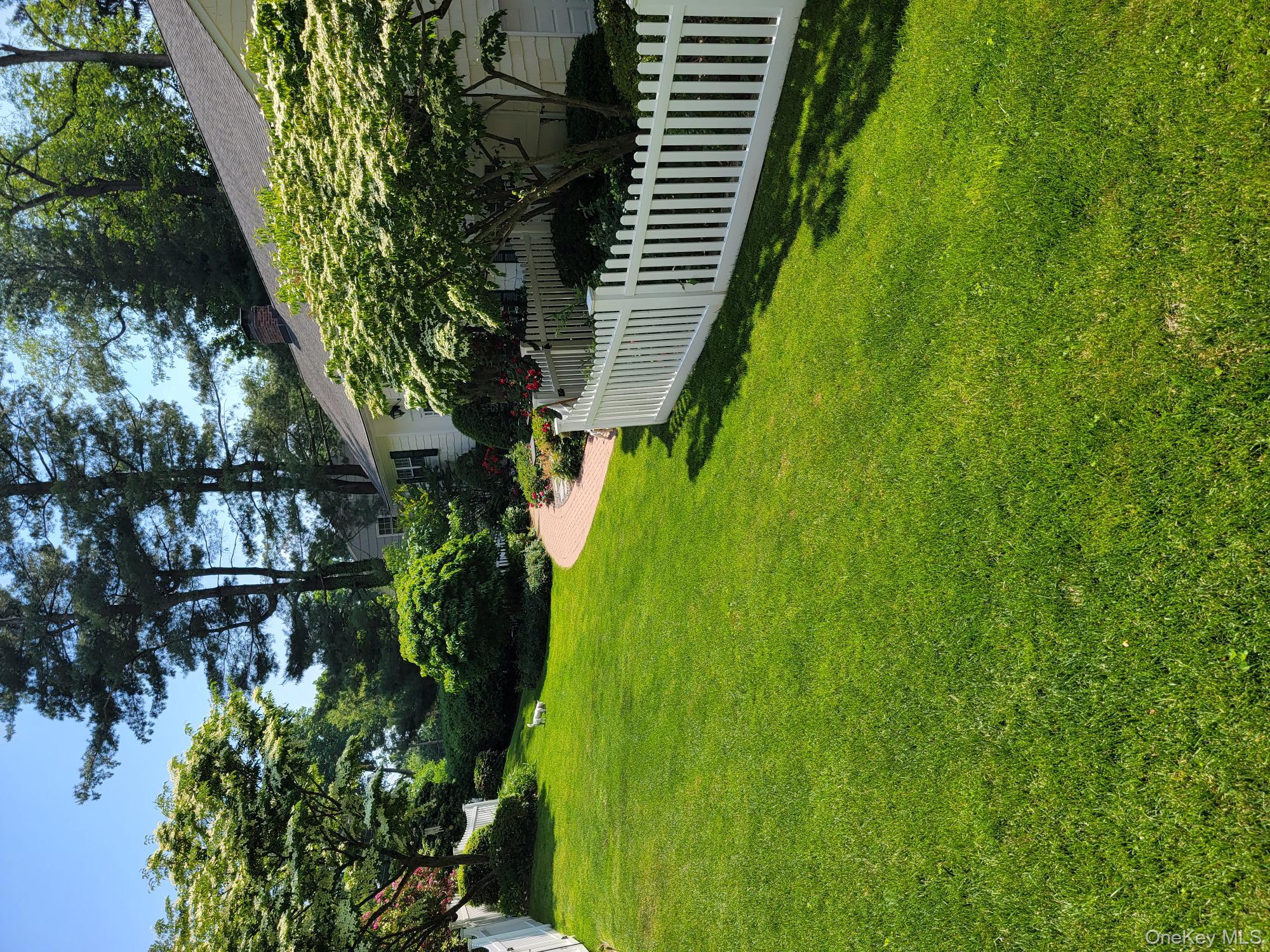 103 River Road Briarcliff Manor, NY 10510 - Photo 35 of 37 a view of garden with wooden fence