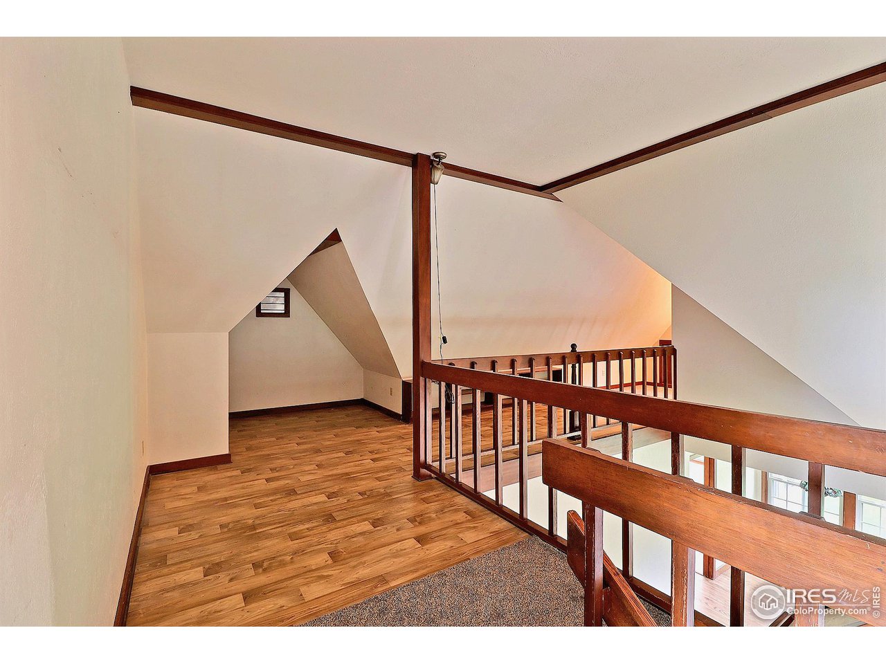 1607 Fairacre Drive Greeley, CO 80631 - Photo 23 of 40 a view of a porch with a floor to ceiling window