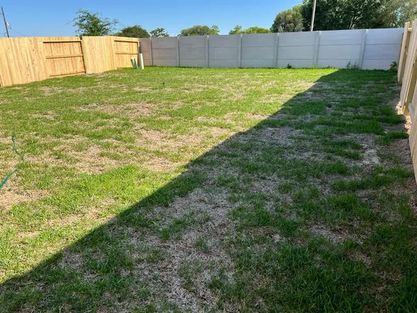 a view of an outdoor space and a yard