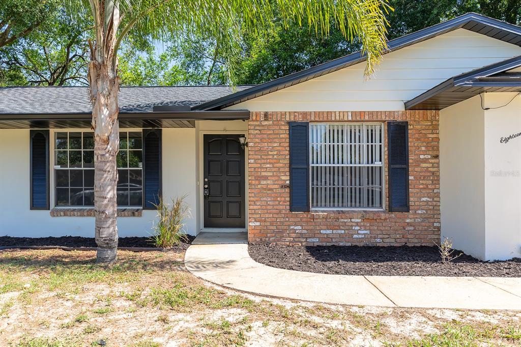a view of a house with snow on the floor