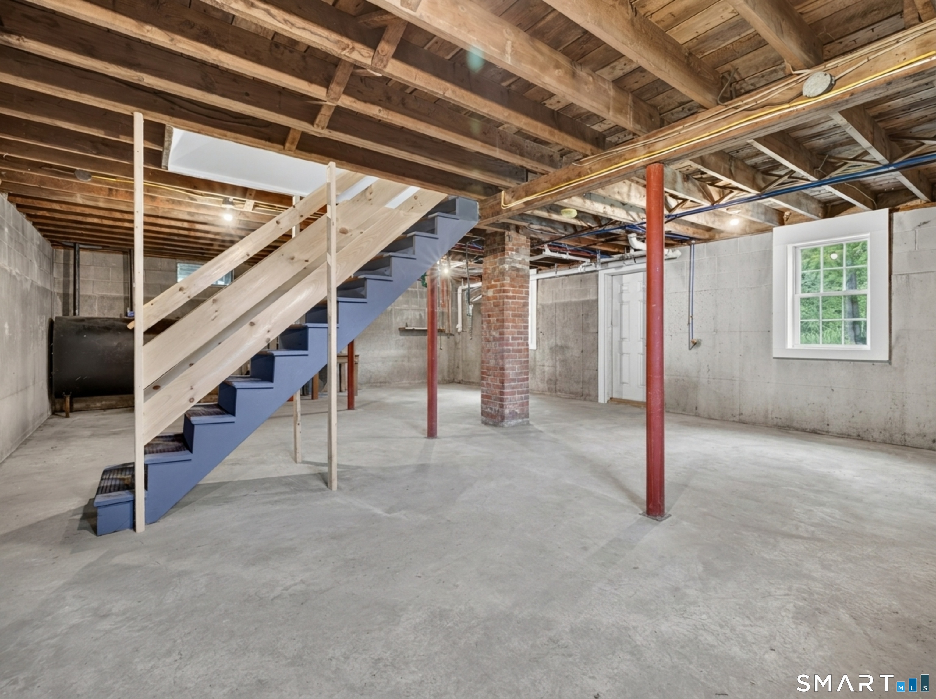 1039 N Road Groton, CT 06340 - Photo 22 of 26 a view of an empty room with stairs