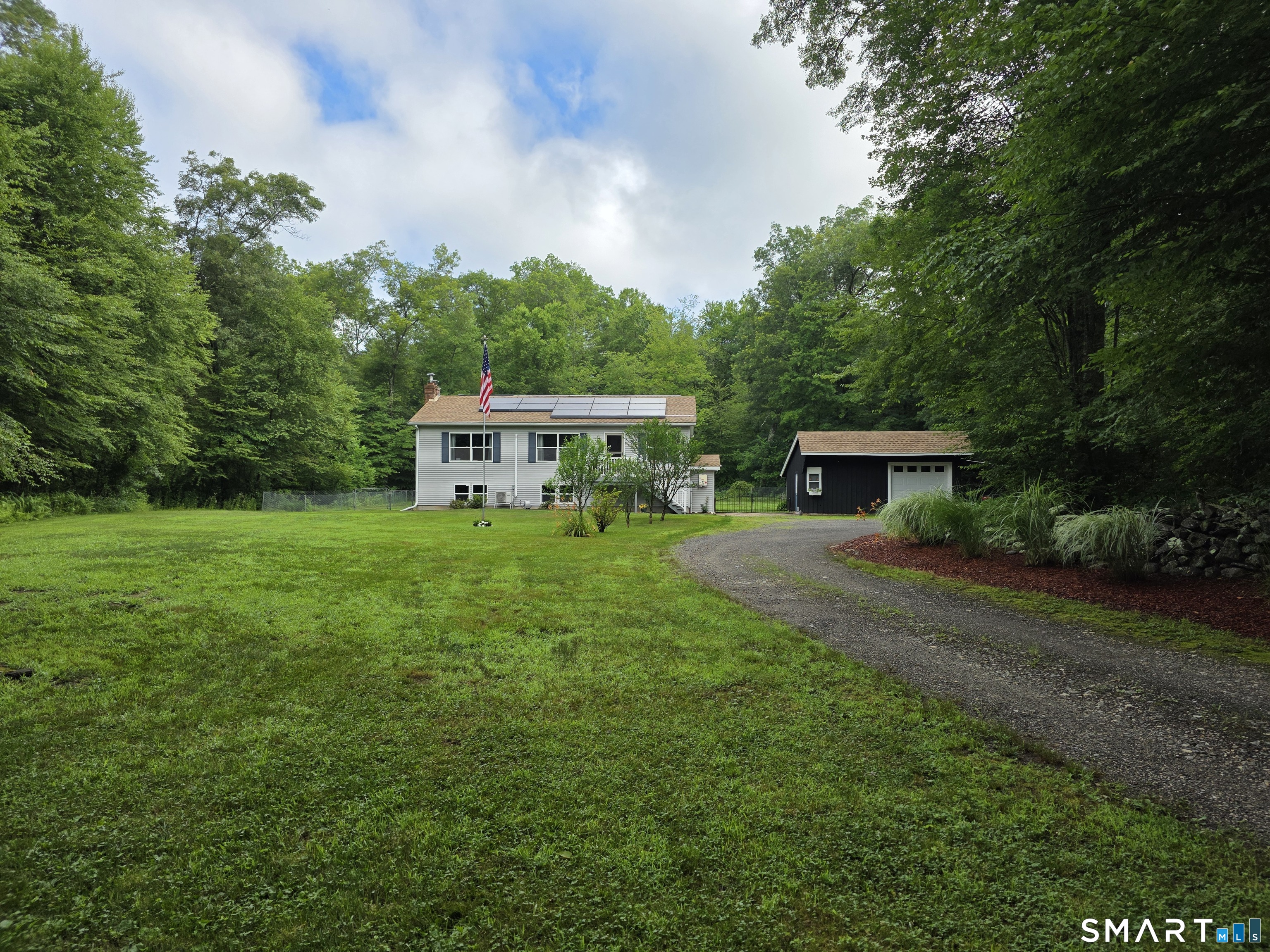 29 Bingham Road Canterbury, CT 06331 - Photo 39 of 40 a front view of a house with garden yard