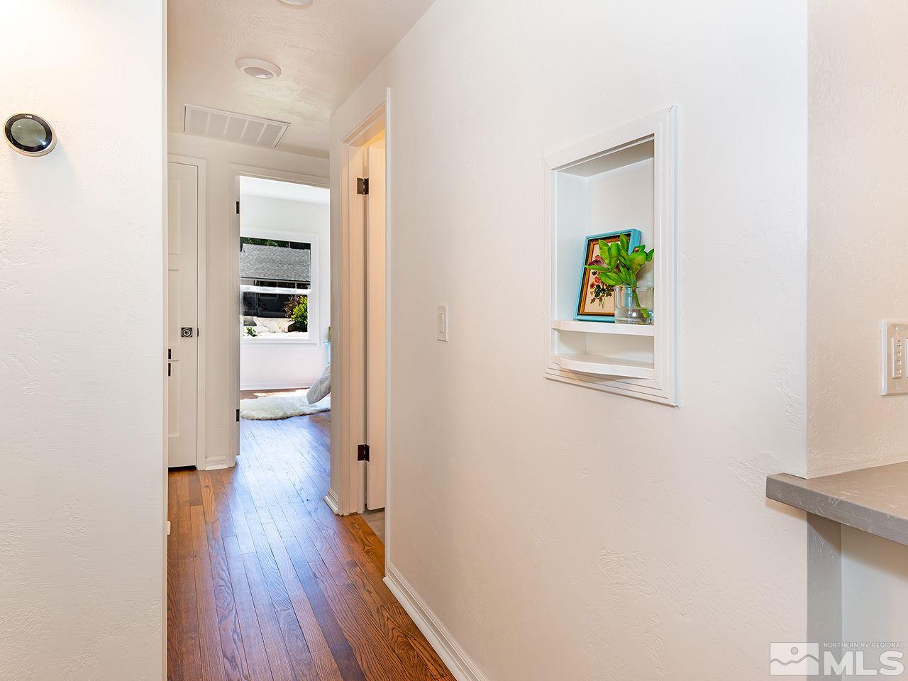 1055 Primrose Street Reno, NV 89509 - Photo 16 of 26 a view of a bedroom from a hallway