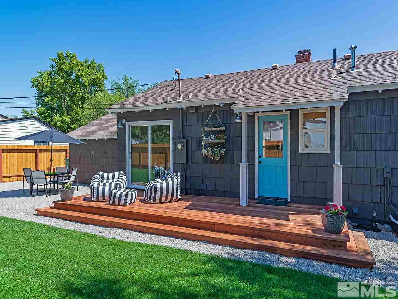 1055 Primrose Street Reno, NV 89509 - Photo 22 of 26 a front view of a house with garden