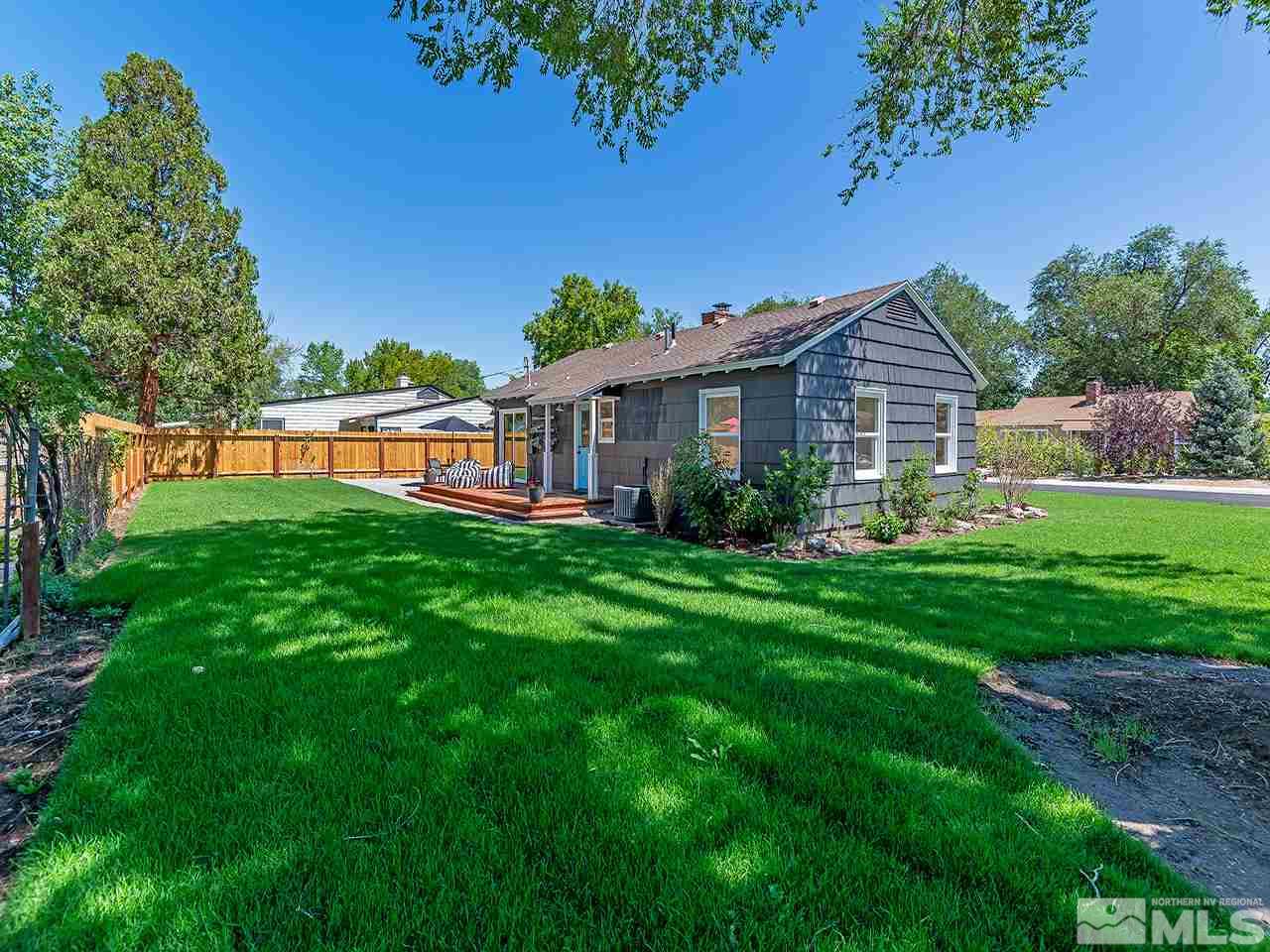 1055 Primrose Street Reno, NV 89509 - Photo 25 of 26 a front view of a house with a yard