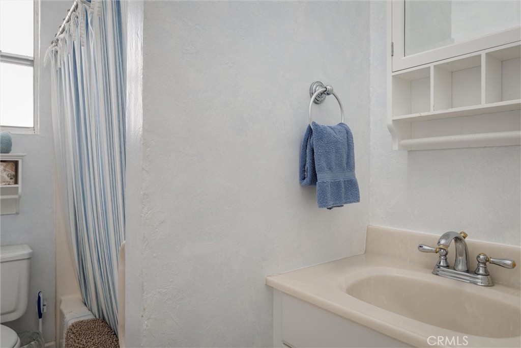 2850 Studio Drive Cayucos, CA 93430 - Photo 29 of 54 a bathroom with a sink and a toilet