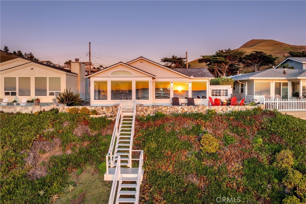 2850 Studio Drive Cayucos, CA 93430 - Photo 36 of 54 a front view of a house with a yard