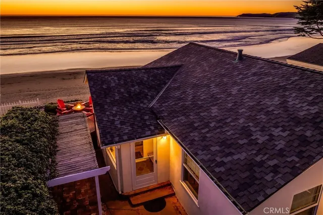 a view of a house with a ocean view