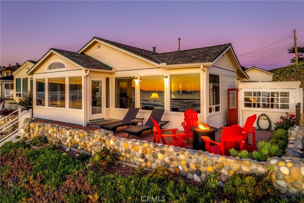 2850 Studio Drive Cayucos, CA 93430 - Photo 50 of 54 a view of a house with large windows and furniture