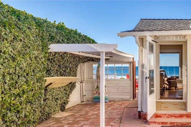 a view of a wooden door and a outdoor space