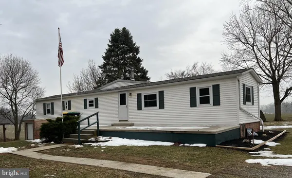 a view of a house with a patio
