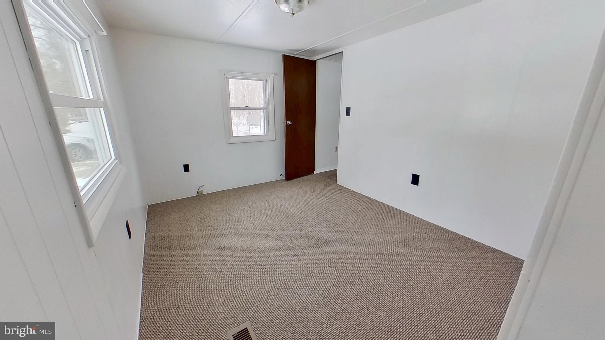 44 Timber Lane Hanover, PA 17331 - Photo 7 of 10 a view of an empty room with a window