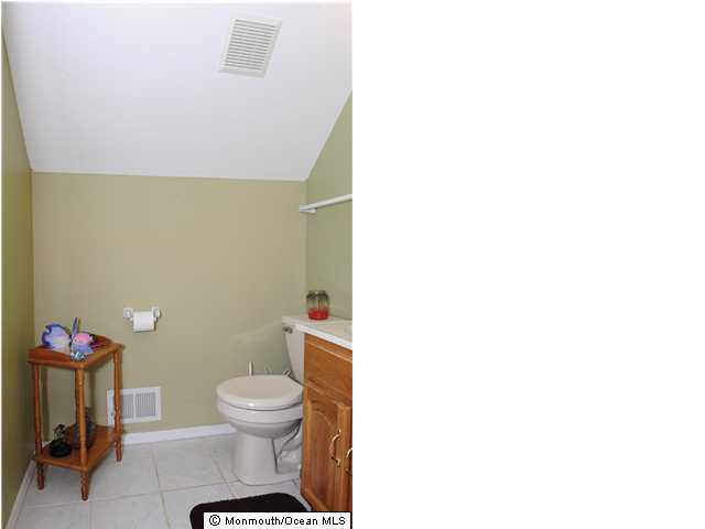 114 Bergerville Road Freehold, NJ 07728 - Photo 11 of 18 a bathroom with a toilet