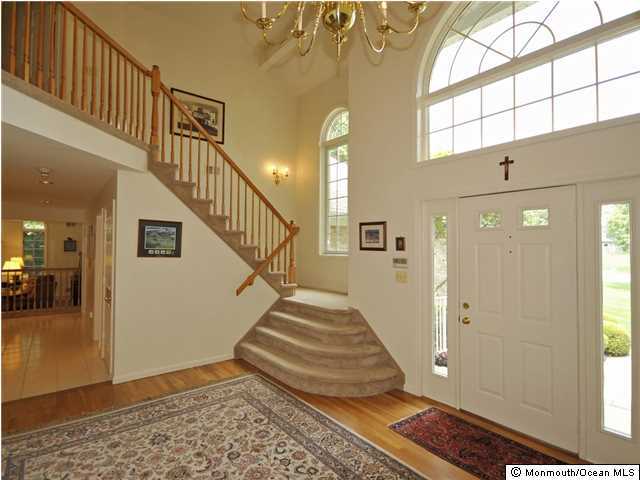 4 Seaman Road Freehold, NJ 07728 - Photo 2 of 13 a view of entryway and hall with wooden floor