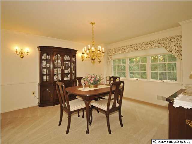 4 Seaman Road Freehold, NJ 07728 - Photo 8 of 13 a dining room with furniture and window