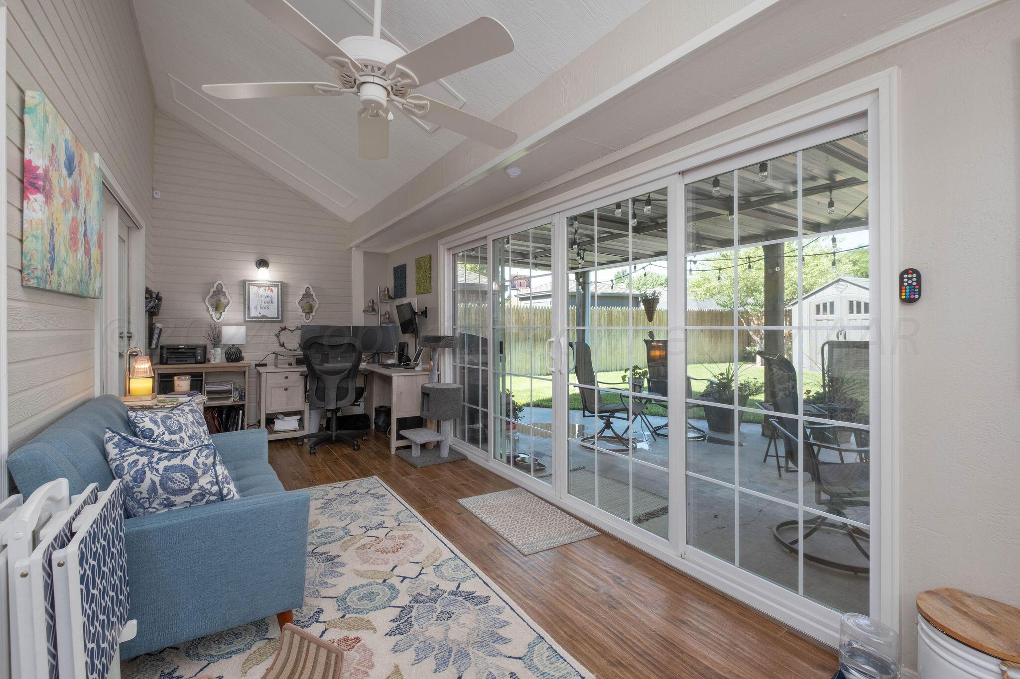 4400 Baltus Place Amarillo, TX 79121 - Photo 16 of 39 a living room with lots of furniture and a large window