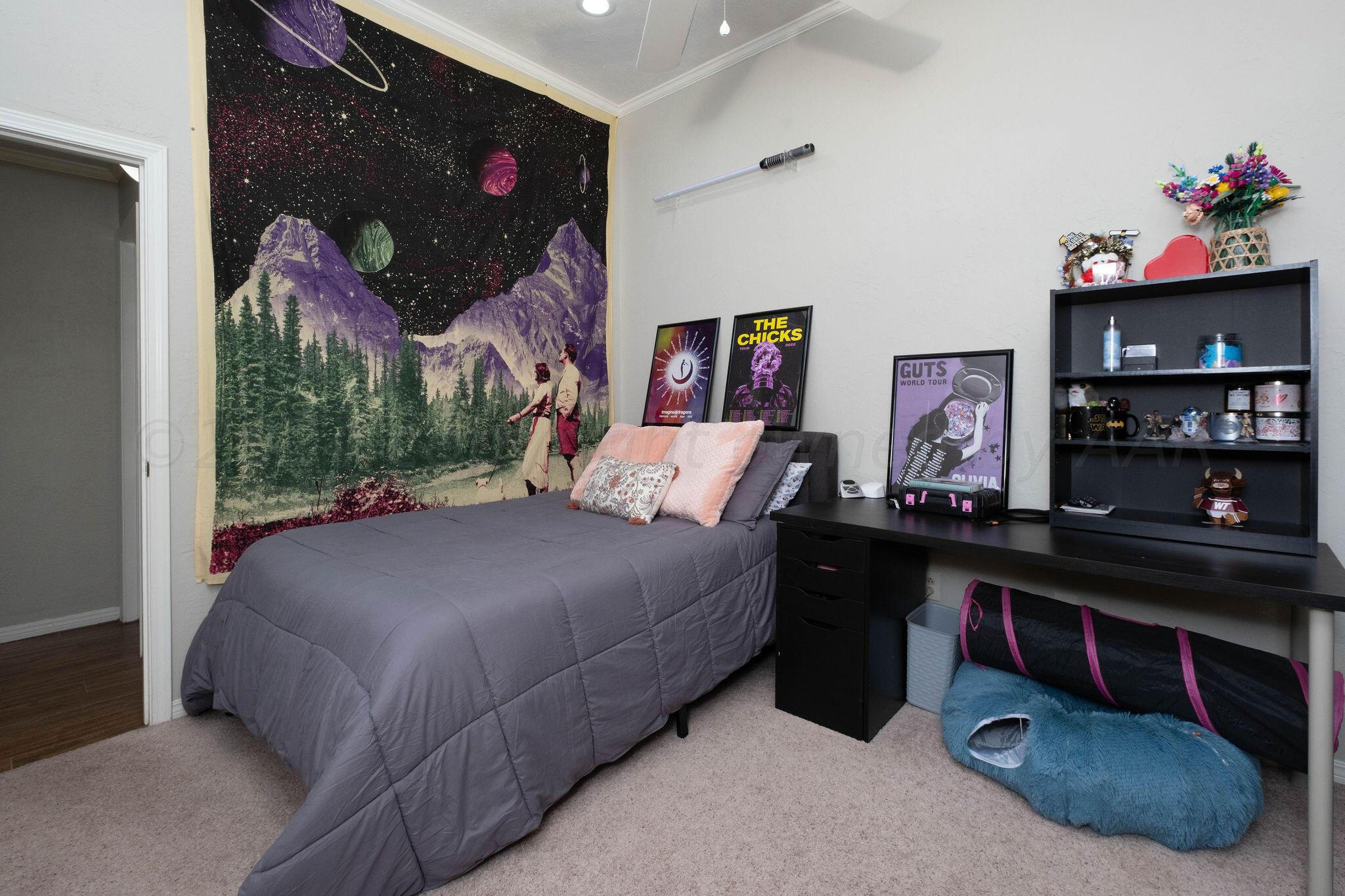 4400 Baltus Place Amarillo, TX 79121 - Photo 28 of 39 a bedroom with a bed and window