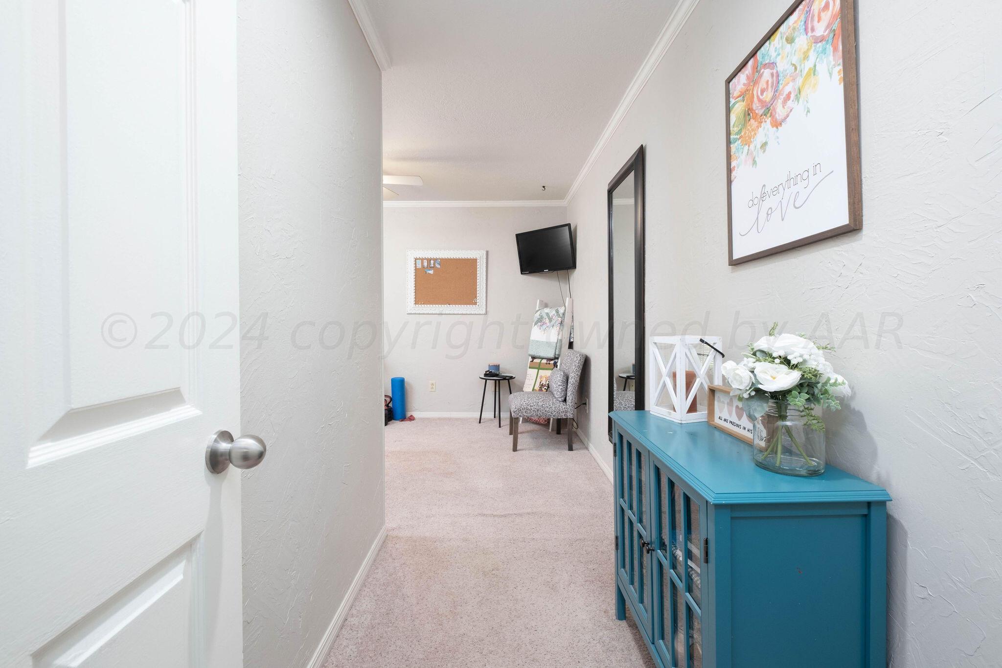 4400 Baltus Place Amarillo, TX 79121 - Photo 30 of 39 a bedroom with furniture and a window