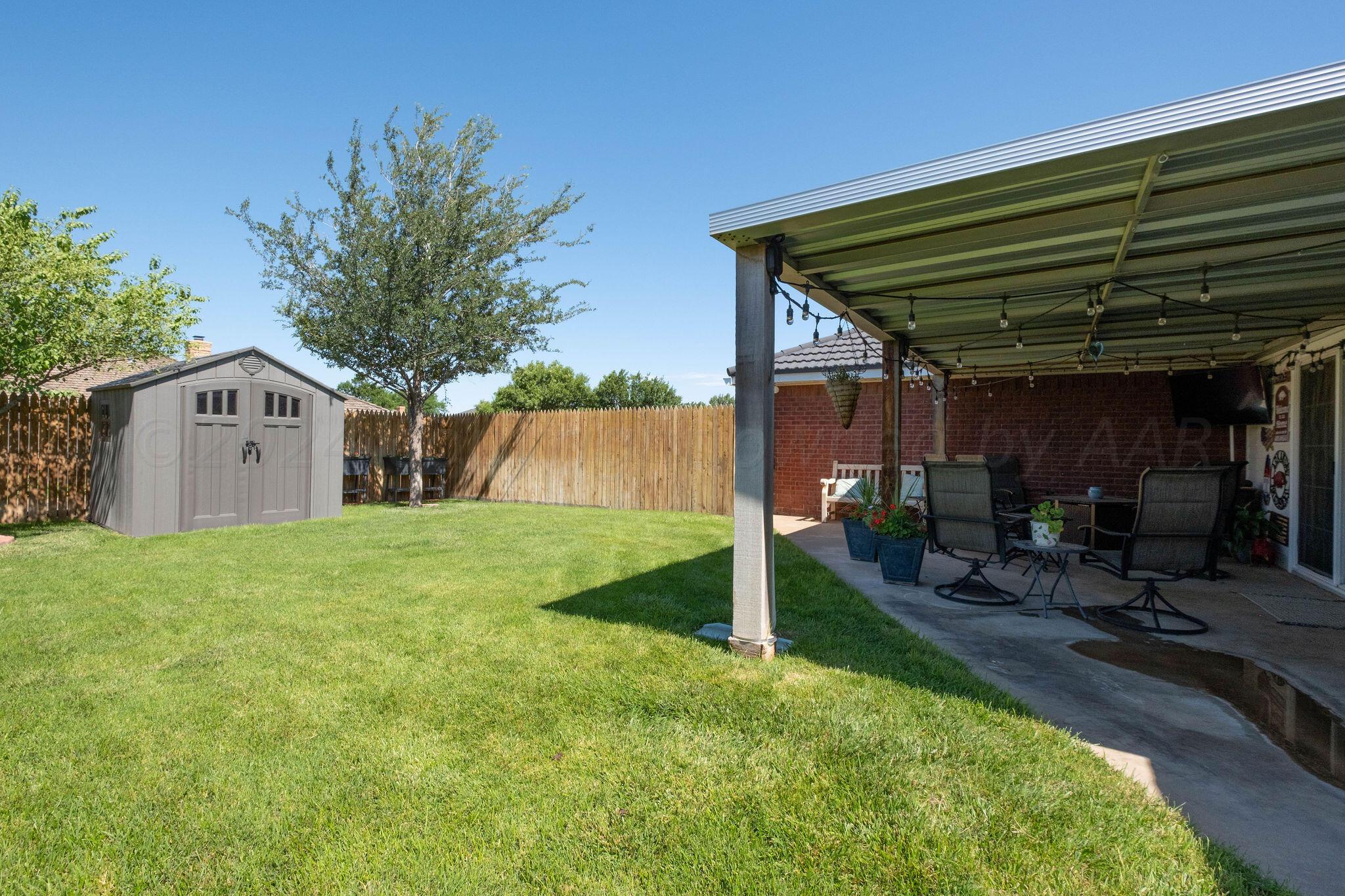 4400 Baltus Place Amarillo, TX 79121 - Photo 39 of 39 a view of a house with backyard and sitting area