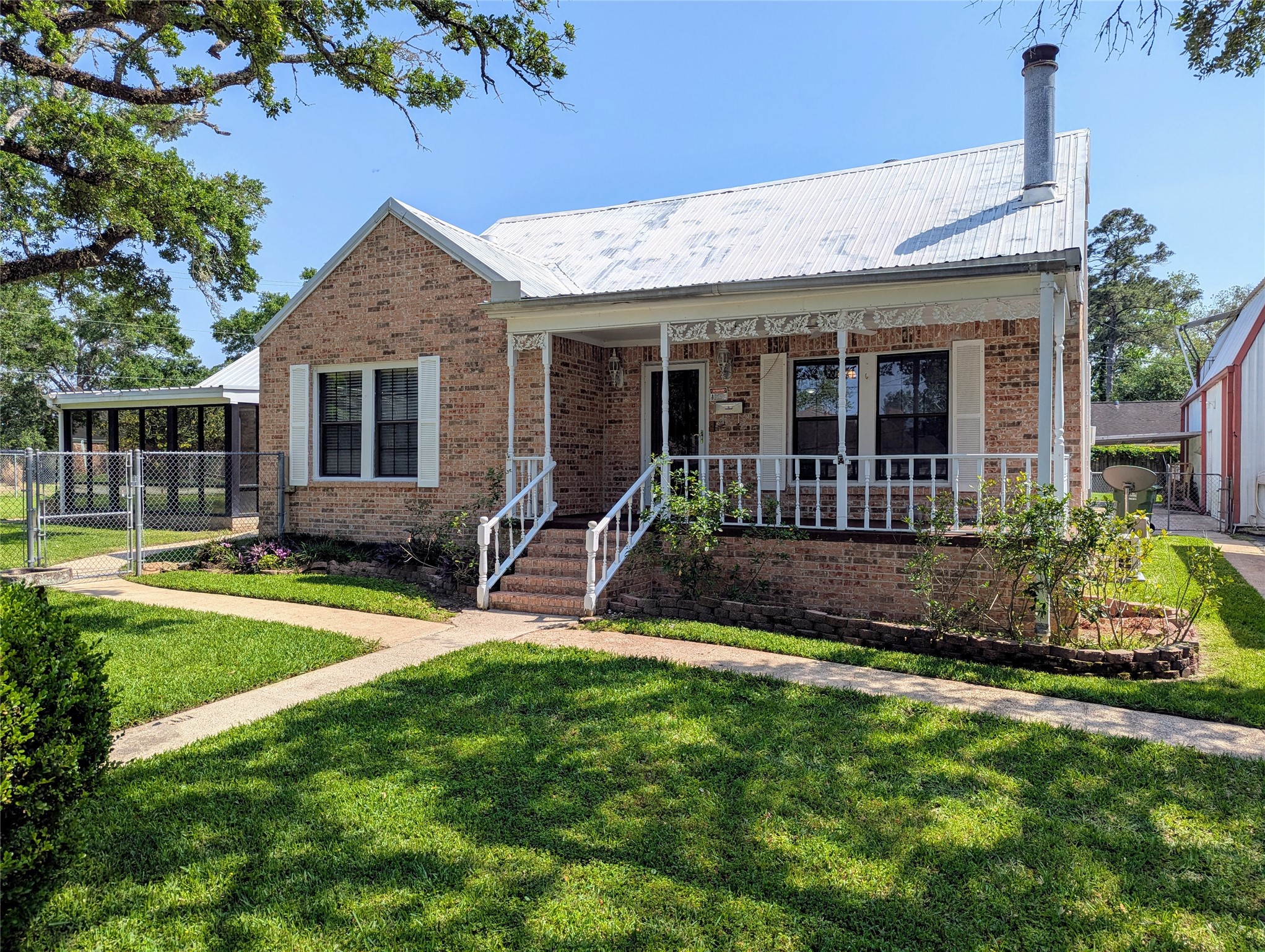 2654 Cos Street Liberty, TX 77575 - Photo 1 of 40 a view of a house with a yard and plants