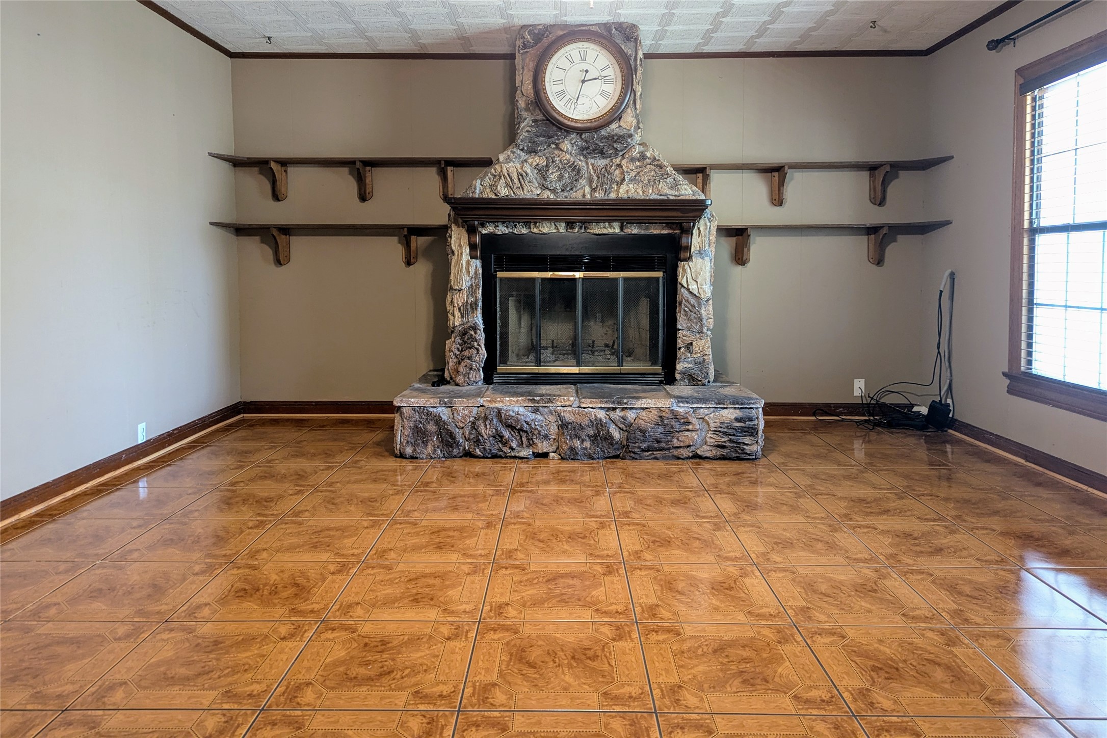 2654 Cos Street Liberty, TX 77575 - Photo 14 of 40 a view of fireplace and window