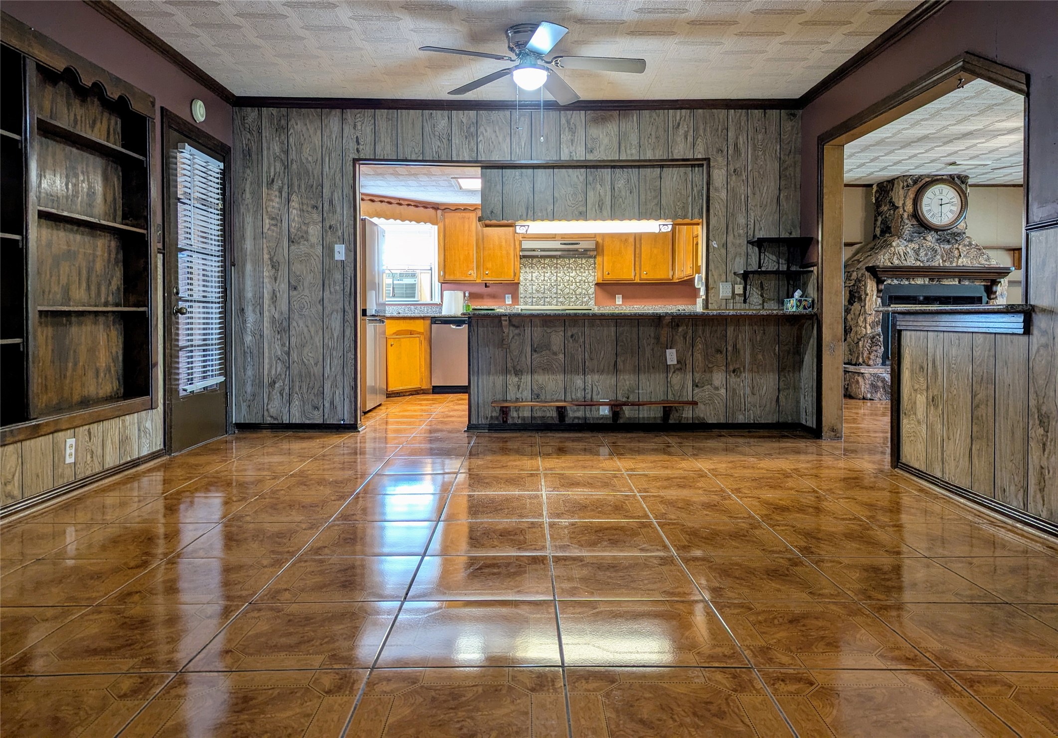 2654 Cos Street Liberty, TX 77575 - Photo 16 of 40 a view of an empty room with window and chandelier