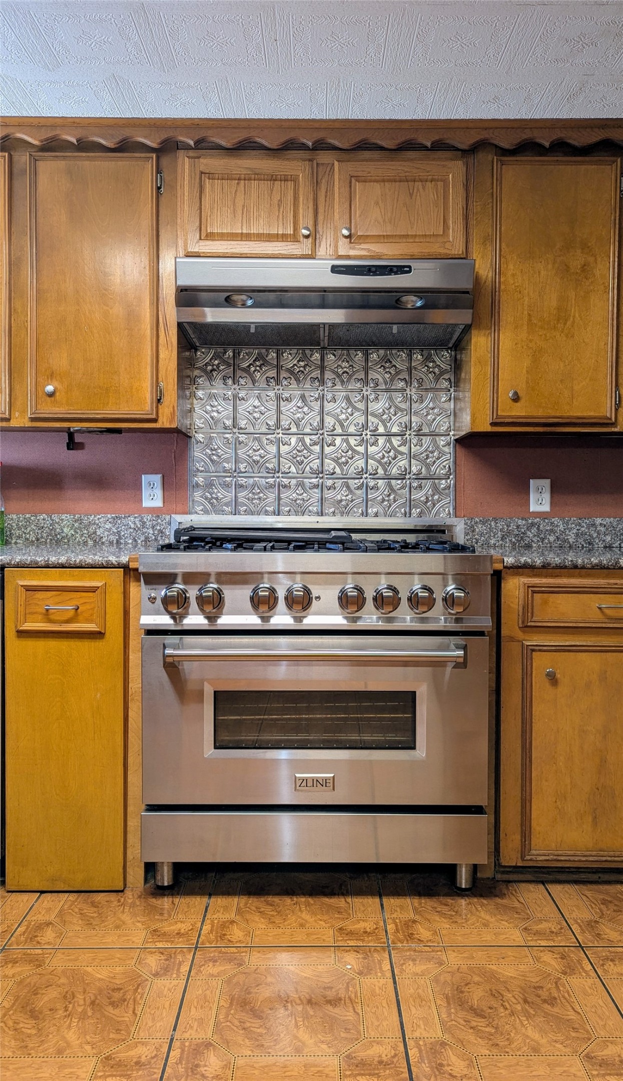 2654 Cos Street Liberty, TX 77575 - Photo 19 of 40 a stove top oven sitting inside of a kitchen