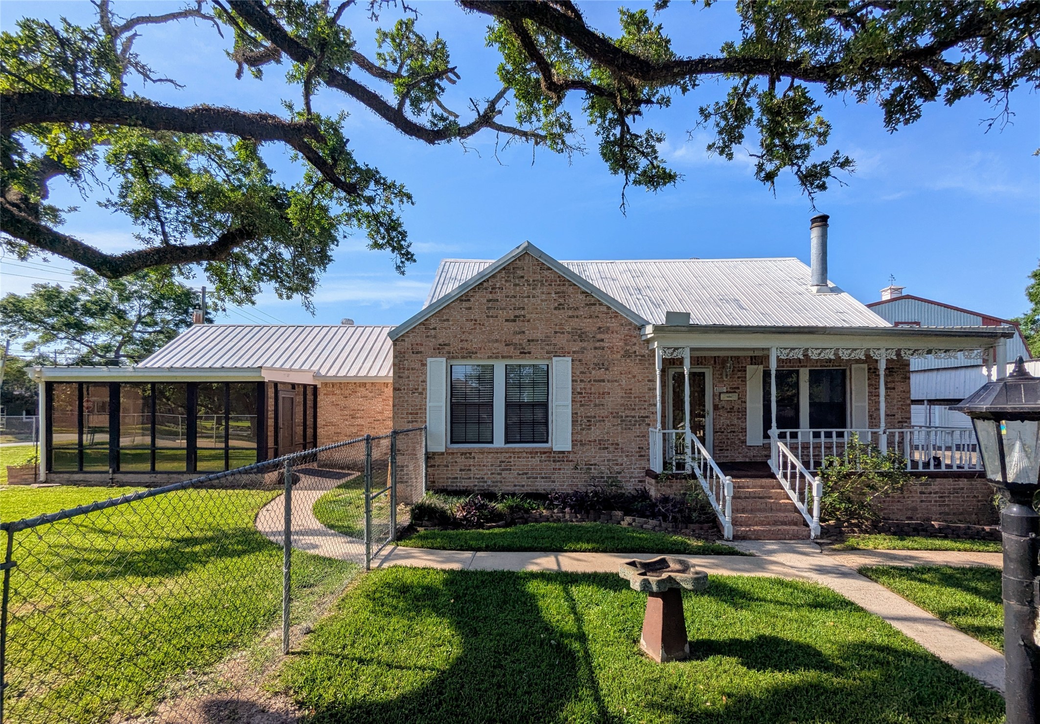 2654 Cos Street Liberty, TX 77575 - Photo 2 of 40 a front view of a house with garden