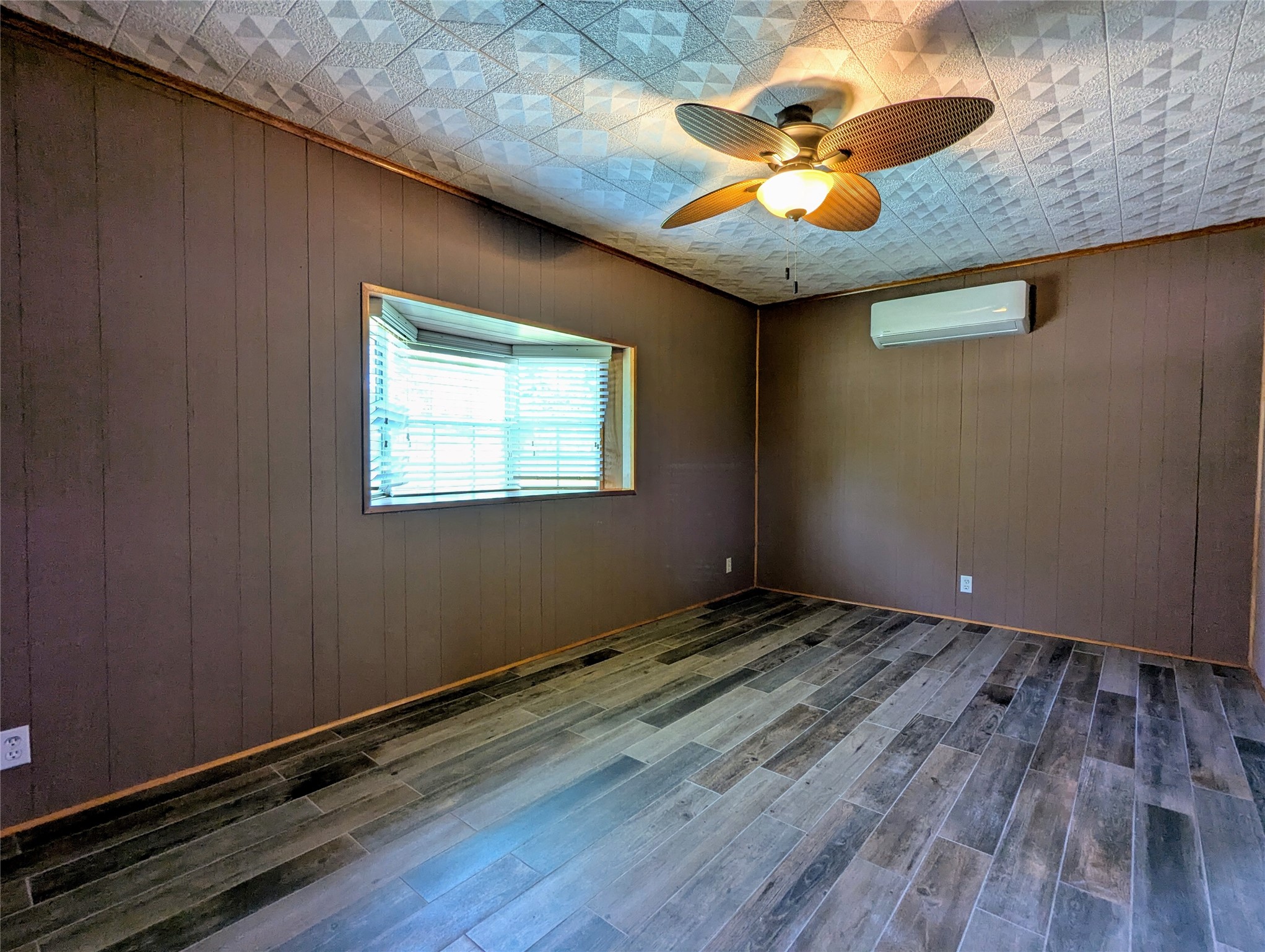 2654 Cos Street Liberty, TX 77575 - Photo 27 of 40 a view of an empty room with a window