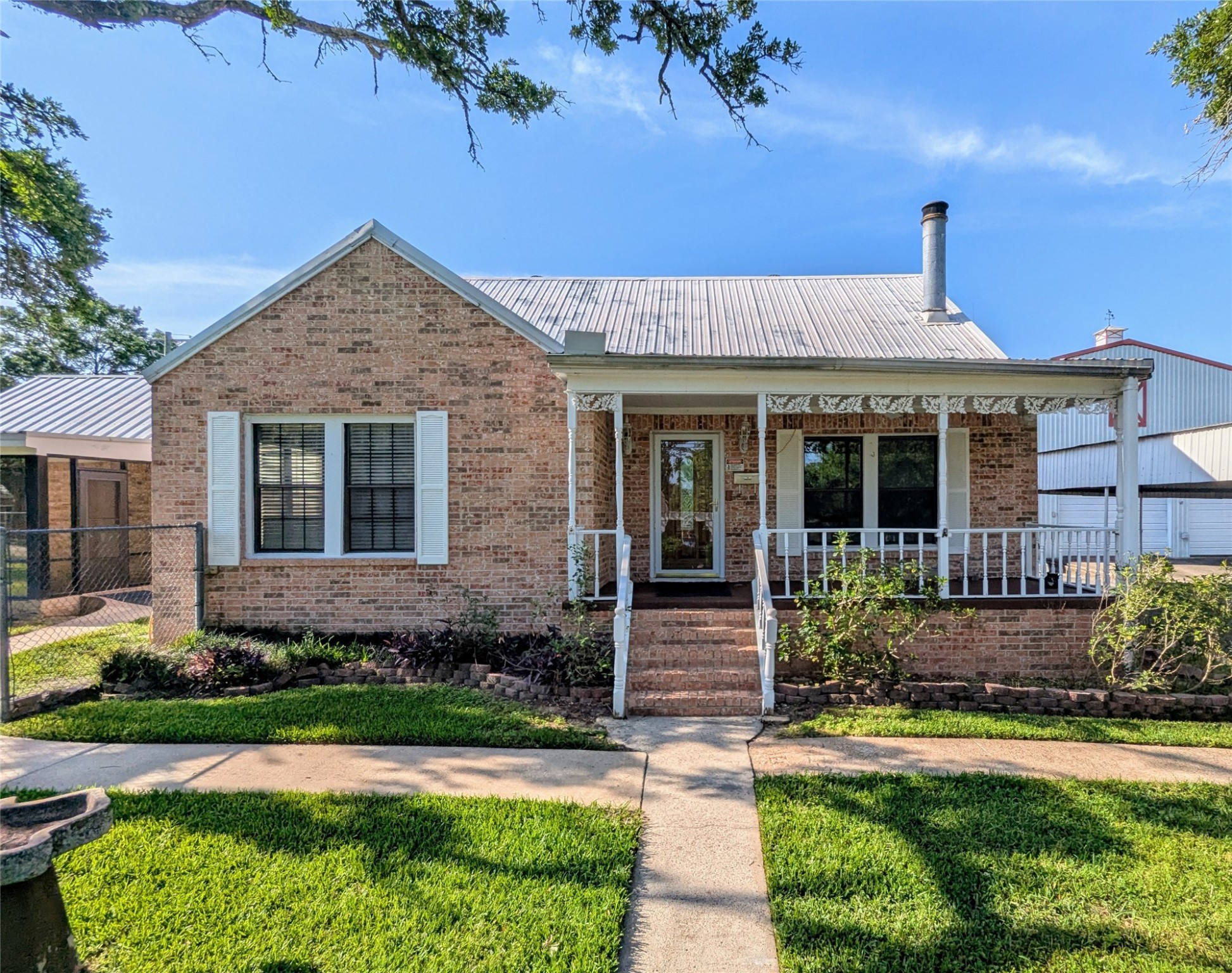 2654 Cos Street Liberty, TX 77575 - Photo 3 of 40 a front view of a house with a yard