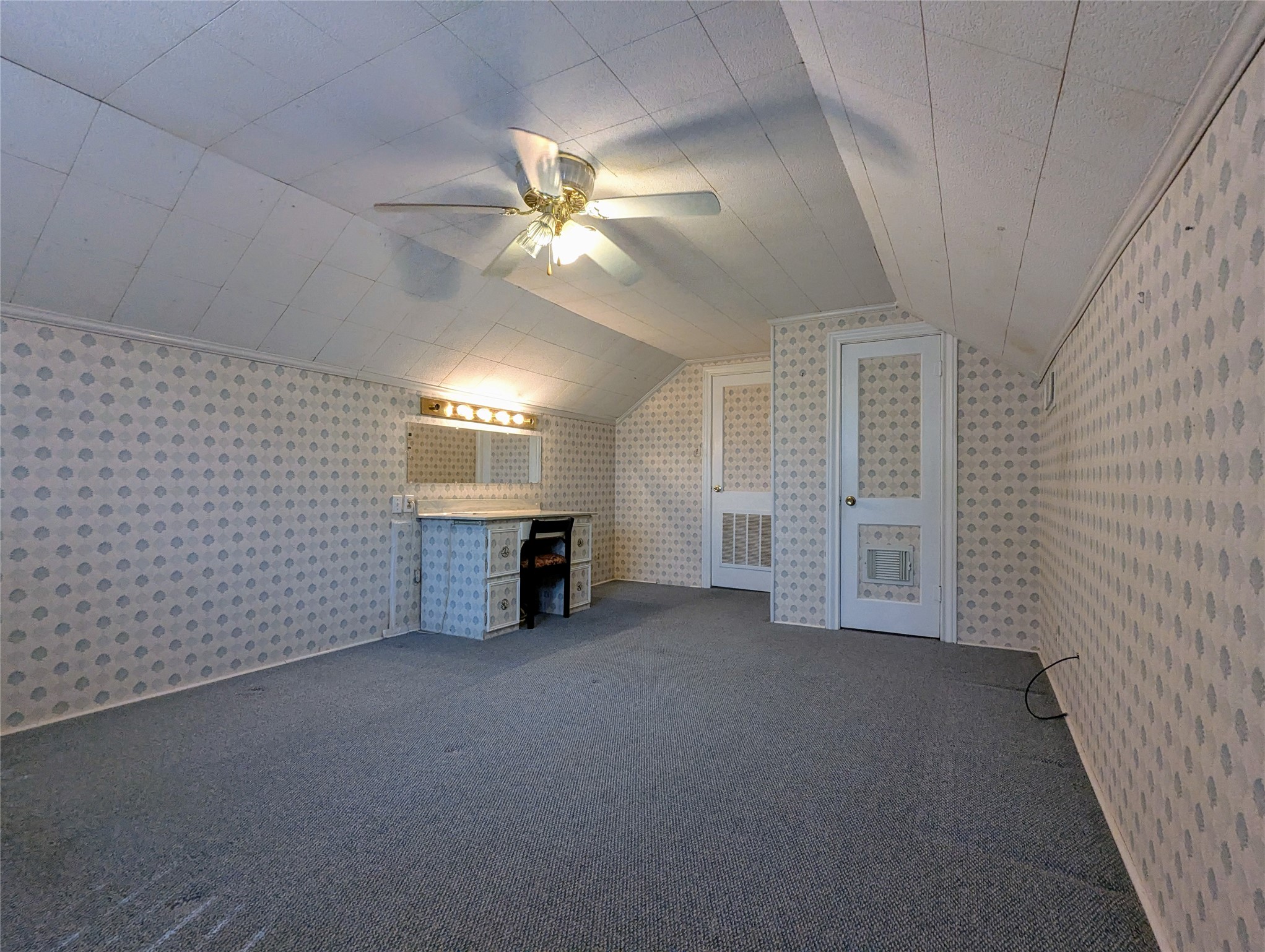 2654 Cos Street Liberty, TX 77575 - Photo 31 of 40 en empty room with windows and ceiling fan