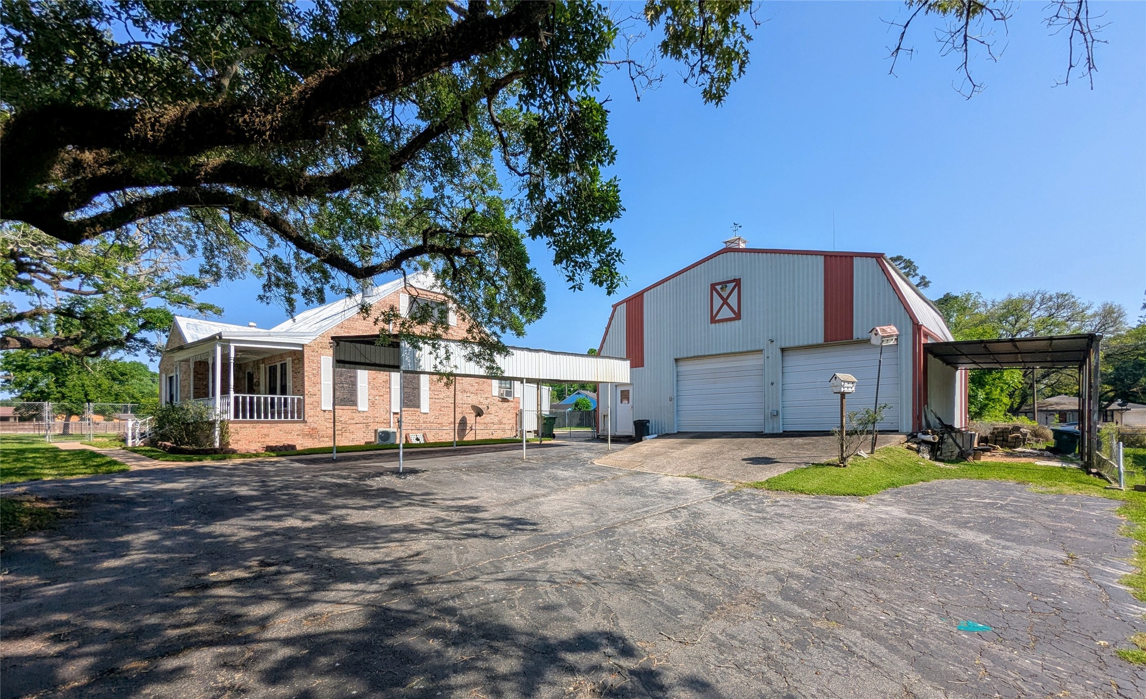 2654 Cos Street Liberty, TX 77575 - Photo 4 of 40 a front view of a house with a yard and garage