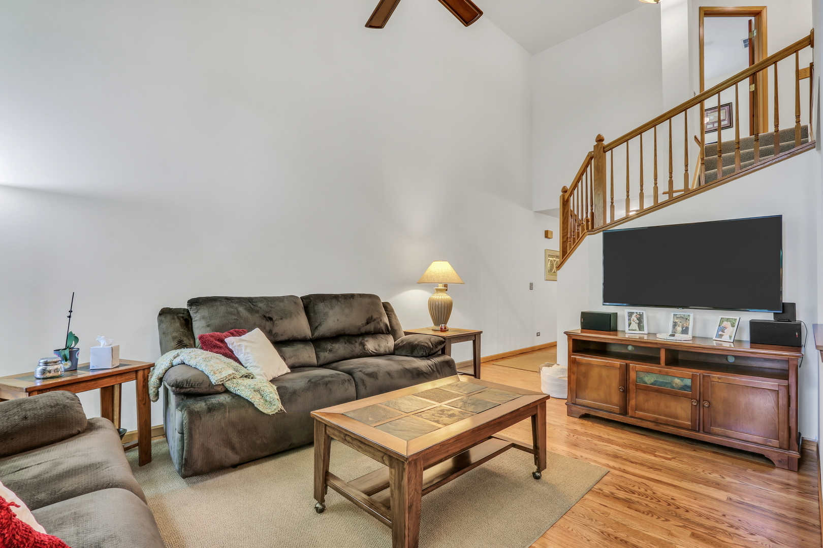 2101 Peach Tree Lane Algonquin, IL 60102 - Photo 7 of 24 a living room with furniture and a flat screen tv