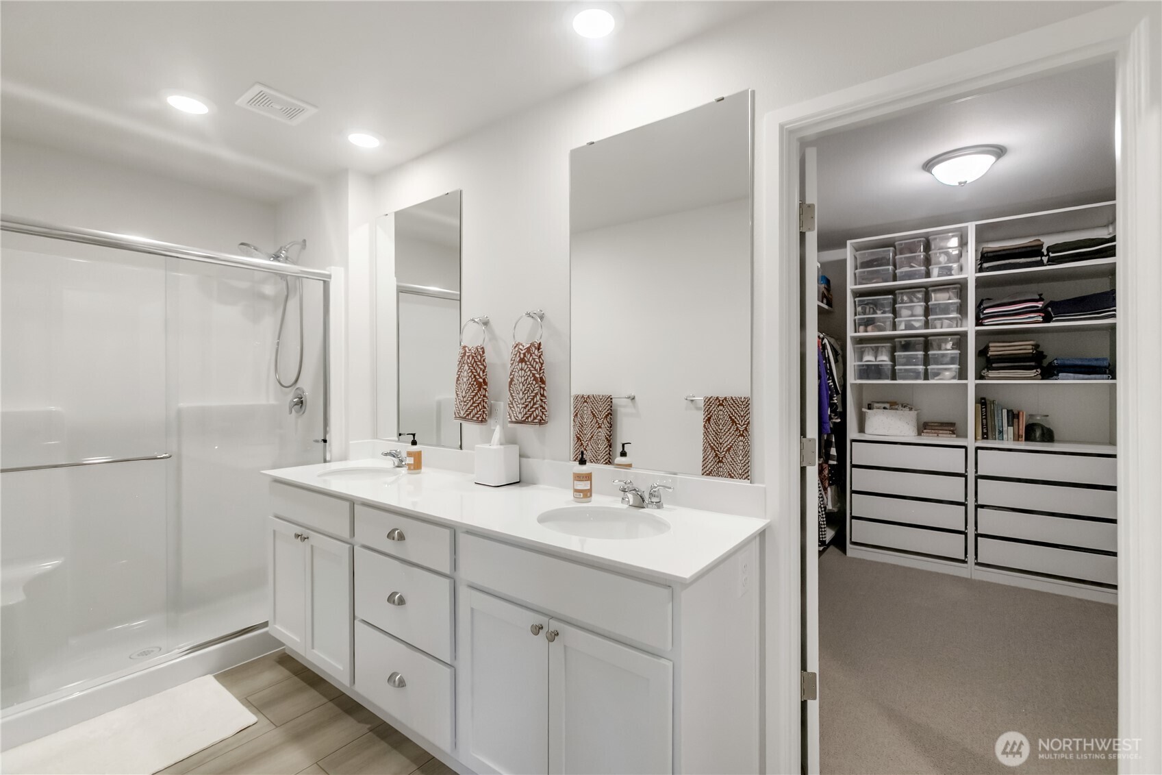 111 Northeast Ridgetop Crossing Belfair, WA 98528 - Photo 22 of 40 a kitchen with a sink double vanity and a shower