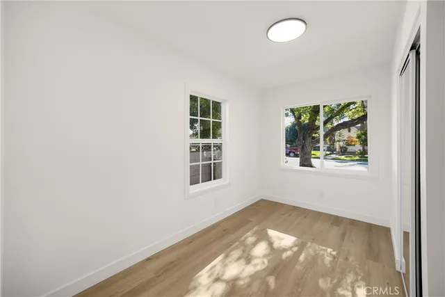 an empty room with windows