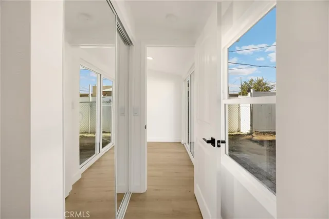 a bathroom with a shower and a sink