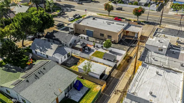 an aerial view of a house with a garden