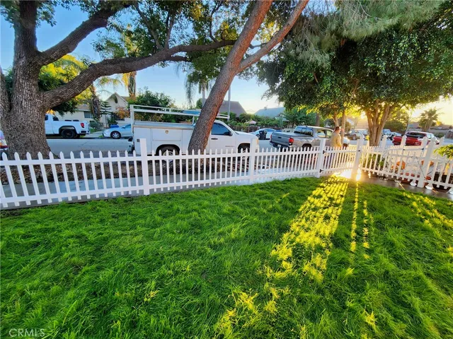 a view of swimming pool from a garden