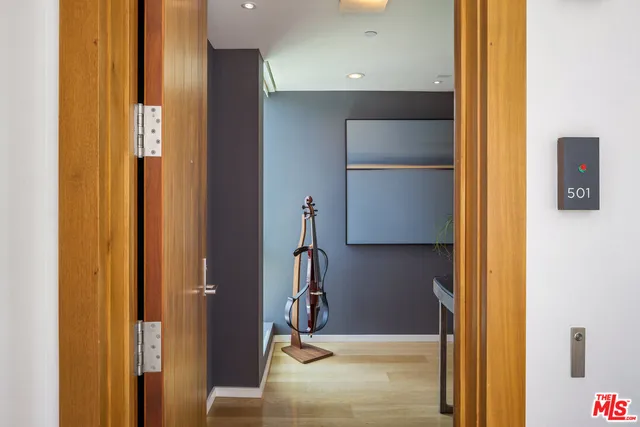 a bathroom with a mirror and a sink