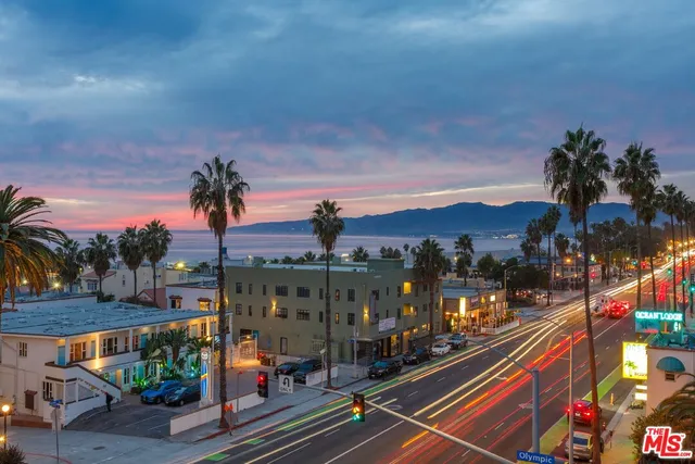 a view of a city with cars