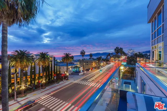 a room with gym equipment and a large window