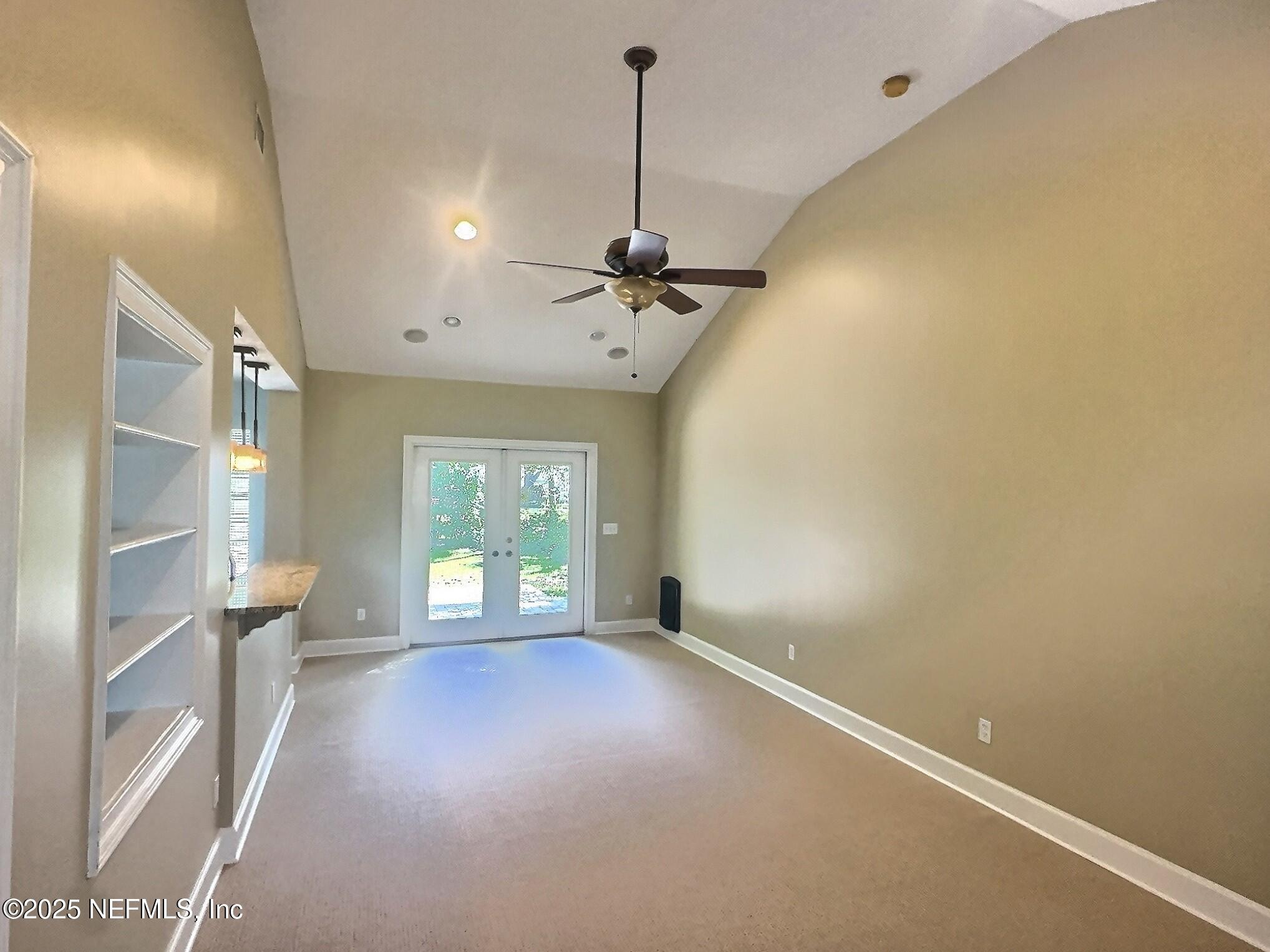 4253 Roma Boulevard Jacksonville, FL 32210 - Photo 6 of 17 a view of an empty room with a window